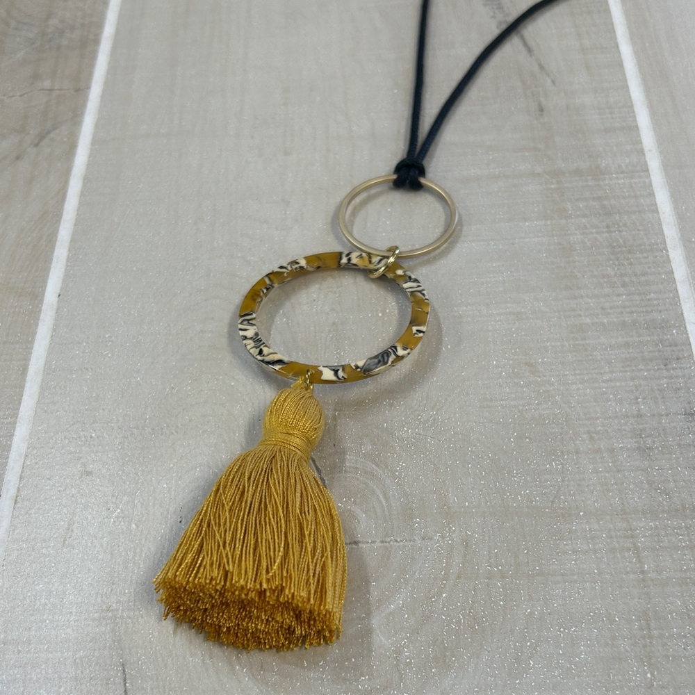 Elegant Gold and Black Tassel Necklace